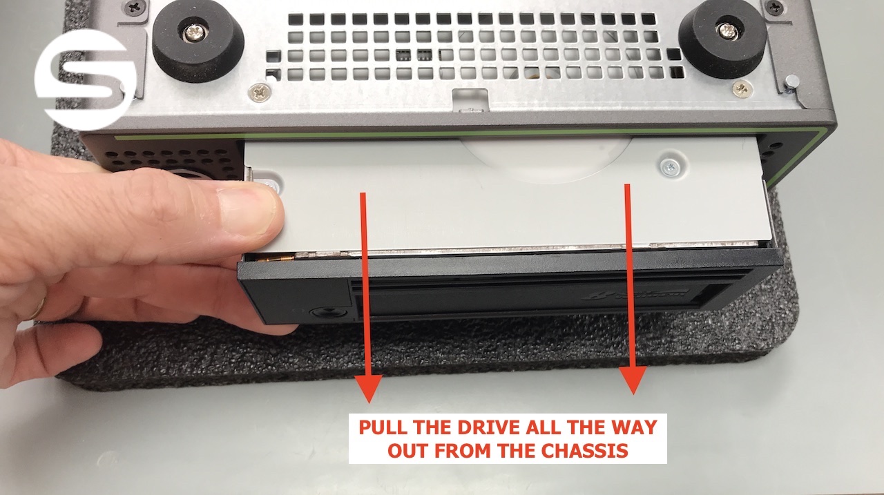 Pulling the LTO drive fully out from the front of the chassis